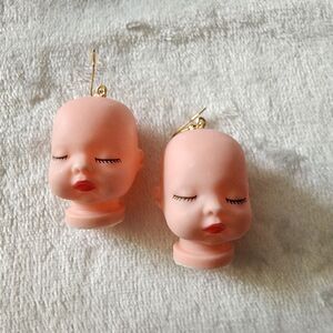 Unbranded Plastic Doll Head Pierced Earrings NWT